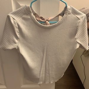 White crop top with pink ribbon tie on back